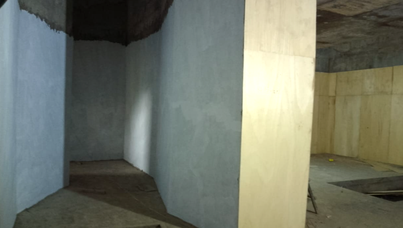 August 2026 - The final plaster coat is applied to the maze walls